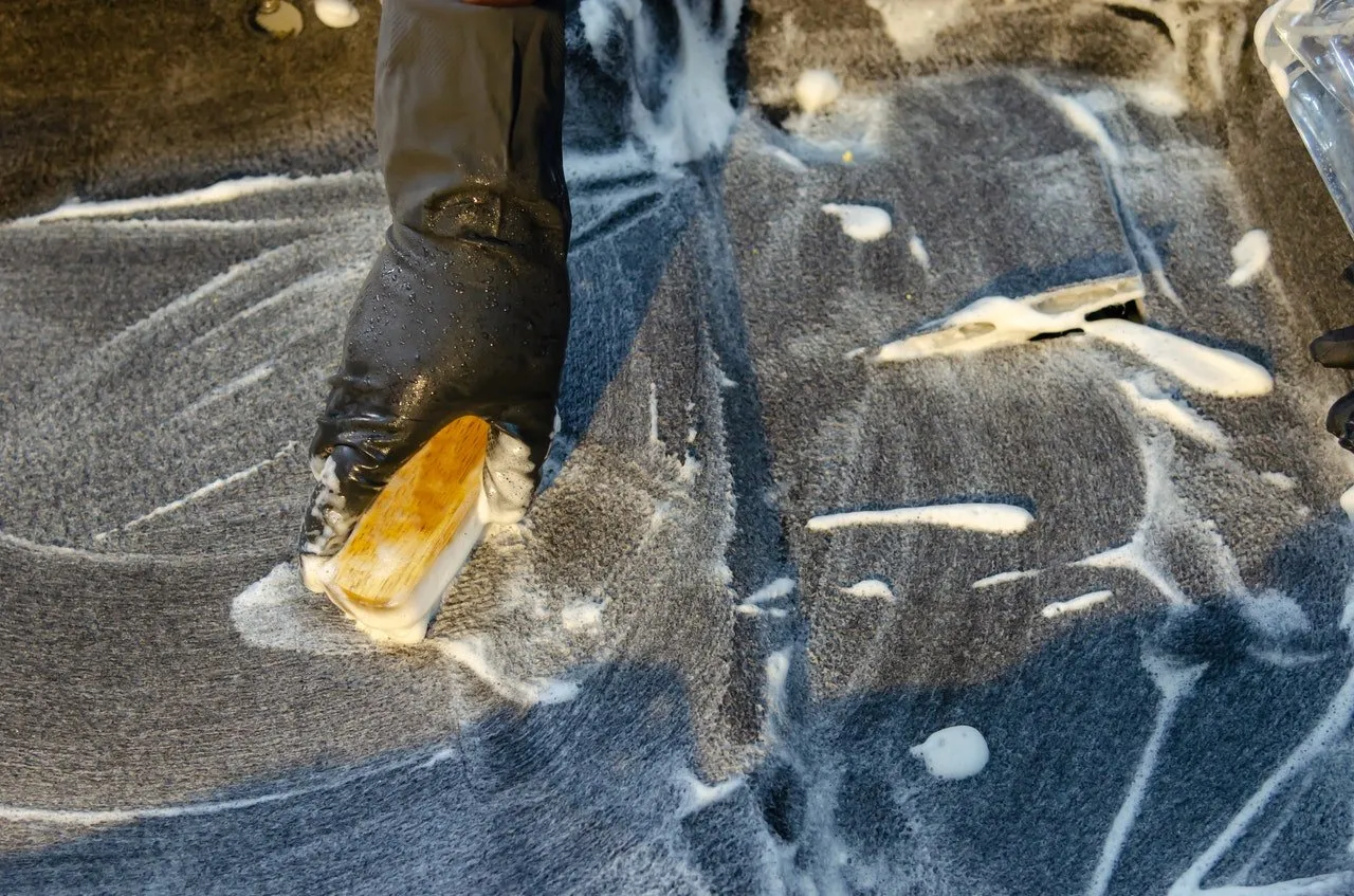 Removing stains from a carpet