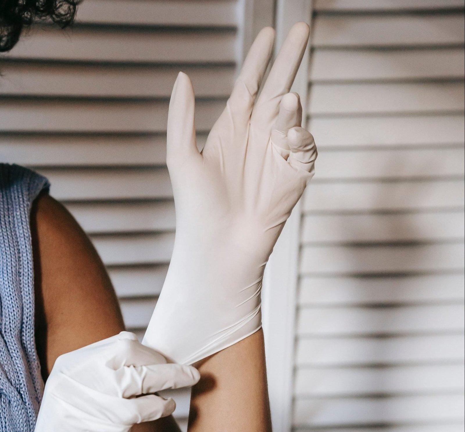 Woman with latex gloves